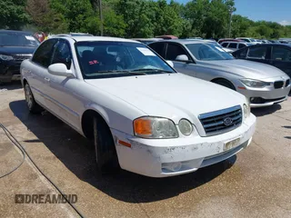 2004 Kia Optima LX z VIN KNAGD126045369294, wystawiony jako IAAI lot #42251578 z przebiegiem 171 588 mil mil oraz . Historia ofert i sprzedaży dostępna na DreamBid. Obrazek 1.