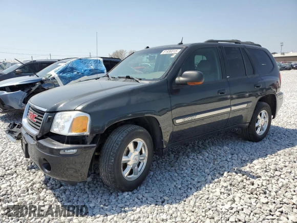 2004 GMC Envoy SLT with VIN 1GKDT13S842421586, listed as a Copart auction lot 51936515 with 188,977 mi miles and Salvage title. Bid and sale history available at DreamBid. Image 1.