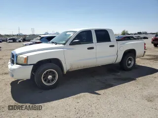 2006 Dodge Dakota SLT z VIN 1D7HE48N36S640721, wystawiony jako Copart lot #60192965 z przebiegiem 163 202 mil mil oraz Czysty tytuł • Clean title. Historia ofert i sprzedaży dostępna na DreamBid. Obrazek 1.