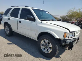 2000 Isuzu Rodeo S with VIN 4S2DM58WXY4302769, listed as a Copart auction lot 70416054 with 150,621 mi miles and Salvage Title. Bid and sale history available at DreamBid. Image 4.