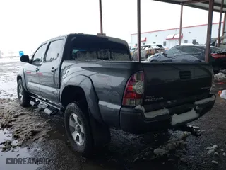 2013 Toyota Tacoma PreRunner with VIN 3TMJU4GN6DM153390, listed as a IAAI auction lot 41300619 with 163,974 mi miles. Bid and sale history available at carsss.com. Image 3.