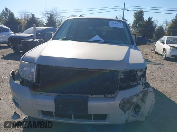 2008 Ford Escape XLT with VIN 1FMCU93158KA39754, listed as a IAAI auction lot 40660179 with 113,956 mi miles. Bid and sale history available at carsss.com. Image 12.