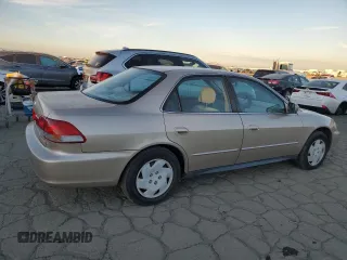 2001 Honda Accord LX z VIN 1HGCG16461A067174, wystawiony jako Copart lot #87543245 z przebiegiem 148 410 mil mil oraz Czysty tytuł • Clean title. Historia ofert i sprzedaży dostępna na DreamBid. Obrazek 3.