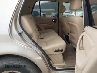 2002 Mercedes-Benz M 320/430/500 z VIN 4JGAB54E82A308902, wystawiony jako IAAI lot #41779482 z przebiegiem 99 933 mil mil oraz . Historia ofert i sprzedaży dostępna na DreamBid. Obrazek 8.