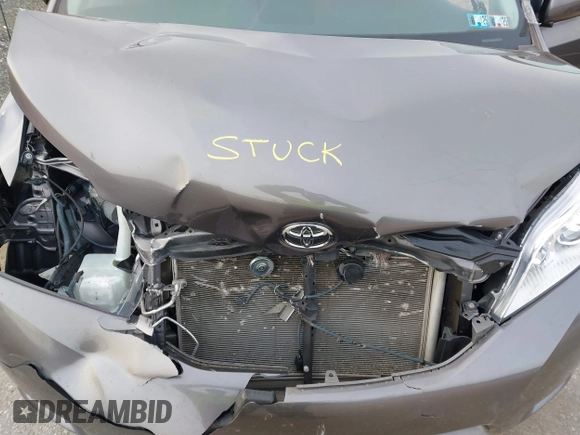 2014 Toyota Sienna LE with VIN 5TDJK3DC1ES087626, listed as a IAAI auction lot 41610813 with 142,311 mi miles and . Bid and sale history available at DreamBid. Image 10.