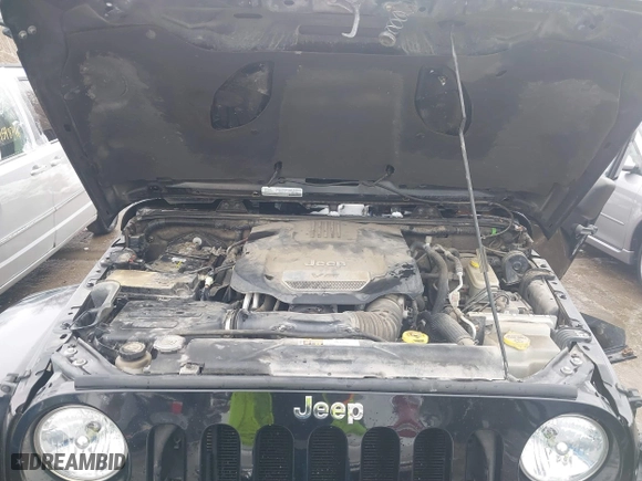 2015 Jeep Wrangler Unlimited Rubicon Hard Rock with VIN 1C4HJWFG9FL569962, listed as a IAAI auction lot 41557801 with 78,597 mi miles. Bid and sale history available at carsss.com. Image 10.