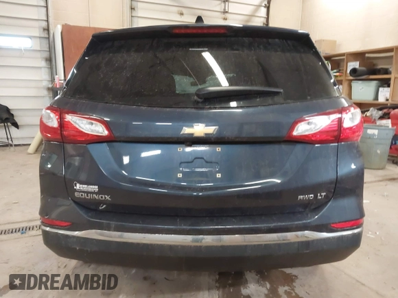 2019 Chevrolet Equinox LT z VIN 3GNAXUEV9KL319387, wystawiony jako IAAI lot #40875475 z przebiegiem 103 016 mil mil oraz . Historia ofert i sprzedaży dostępna na DreamBid. Obrazek 17.