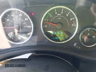 2013 Jeep Wrangler Sport with VIN 1C4AJWAG3DL608342, listed as a IAAI auction lot 41858662 with 118,504 mi miles and . Bid and sale history available at DreamBid. Image 7.