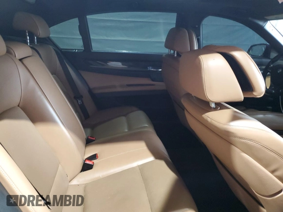 2015 BMW 7 Series 750Li xDrive z VIN WBAYF8C57FD653916, wystawiony jako Copart lot #52864275 z przebiegiem 138 811 mil mil oraz Szkoda całkowita • Salvage title. Historia ofert i sprzedaży dostępna na DreamBid. Obrazek 10.