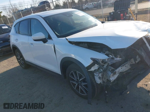 2018 Mazda CX-5 S Premium with VIN JM3KFBDM8J1419006, listed as a IAAI auction lot 41498658 with 123,622 mi miles and . Bid and sale history available at DreamBid. Image 1.