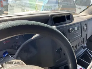 2014 Ford Econoline Cargo Commercial with VIN 1FTNE1EW0EDA46745, listed as a IAAI auction lot 42079336 with 165,582 mi miles and . Bid and sale history available at DreamBid. Image 1.