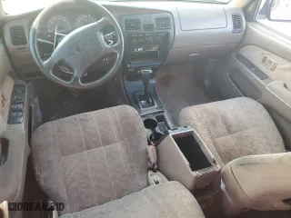 2000 Toyota 4Runner with VIN JT3GM84RXY0063021, listed as a Copart auction lot 82144274 with 310,186 mi miles and Salvage Title. Bid and sale history available at carsss.com. Image 8.