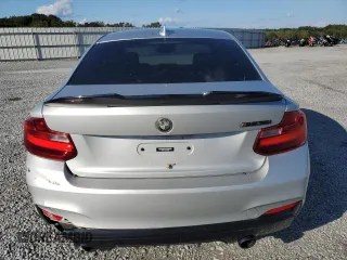 2015 BMW 2 Series M235i with VIN WBA1J7C57FV254038, listed as a Copart auction lot 73657294 with 117,883 mi miles and Salvage Title. Bid and sale history available at carsss.com. Image 6.