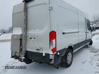 2021 Ford Transit Cargo with VIN 1FTBR1C87MKA51317, listed as a IAAI auction lot 41257947 with 62,000 mi miles and . Bid and sale history available at DreamBid. Image 4.