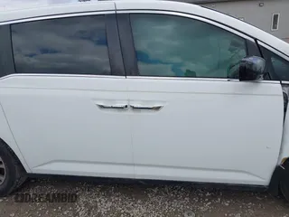 2012 Honda Odyssey EX-L with VIN 5FNRL5H67CB082903, listed as a IAAI auction lot 42015904 with 208,300 mi miles and . Bid and sale history available at carsss.com. Image 13.