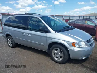 2005 Dodge Caravan SXT z VIN 2D4GP44L25R324539, wystawiony jako IAAI lot #42532136 z przebiegiem 273 171 mil mil oraz . Historia ofert i sprzedaży dostępna na DreamBid. Obrazek 1.