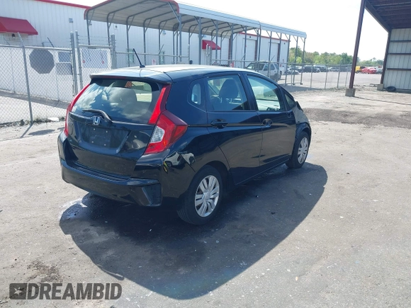 2016 Honda Fit LX with VIN JHMGK5H57GS010902, listed as a IAAI auction lot 41902395 with 124,531 mi miles. Bid and sale history available at carsss.com. Image 4.