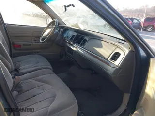 2001 Ford Crown Victoria with VIN 2FAFP73W71X112219, listed as a IAAI auction lot 41879317 with 159,344 mi miles. Bid and sale history available at carsss.com. Image 5.