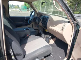 2003 Ford Ranger XL with VIN 1FTYR10D13TA21590, listed as a IAAI auction lot 42069416 with 56,305 mi miles. Bid and sale history available at carsss.com. Image 5.