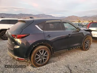2018 Mazda CX-5 Grand Touring with VIN JM3KFBDM9J1326933, listed as a Copart auction lot 82180164 with 99,574 mi miles and Salvage title. Bid and sale history available at DreamBid. Image 3.