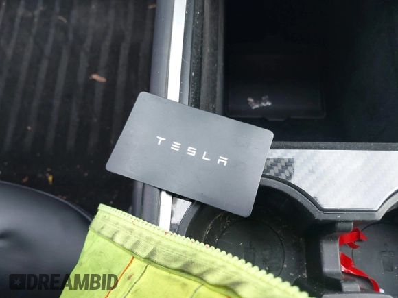2021 Tesla Model Y Performance with VIN 5YJYGDEF1MF262930, listed as a IAAI auction lot 41606321 with 28,882 mi miles and . Bid and sale history available at DreamBid. Image 11.