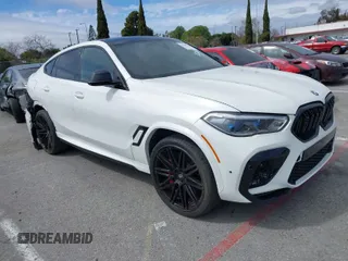 2022 BMW X6 M with VIN 5YMCY0C03N9J18331, listed as a IAAI auction lot 41815291 with 14,907 mi miles. Bid and sale history available at carsss.com. Image 1.