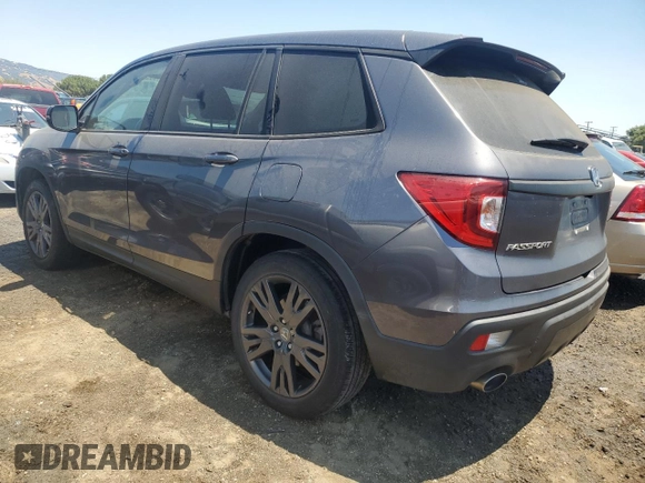 2021 Honda Passport EX-L with VIN 5FNYF7H5XMB013999, listed as a Copart auction lot 61893804 with 52,859 mi miles and Salvage Title. Bid and sale history available at carsss.com. Image 2.
