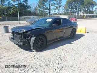 2019 Dodge Charger SXT with VIN 2C3CDXBG6KH702928, listed as a IAAI auction lot 41691312 with 108,832 mi miles and . Bid and sale history available at DreamBid. Image 18.