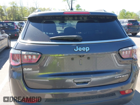 2019 Jeep Compass Sport with VIN 3C4NJCAB2KT613117, listed as a IAAI auction lot 41999519 with 73,734 mi miles and . Bid and sale history available at DreamBid. Image 16.