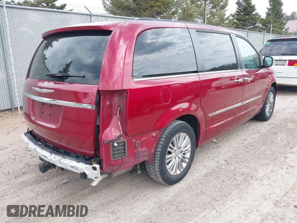 2014 Chrysler Town & Country Touring L with VIN 2C4RC1CGXER307492, listed as a IAAI auction lot 42021290 with 98,845 mi miles and . Bid and sale history available at carsss.com. Image 4.