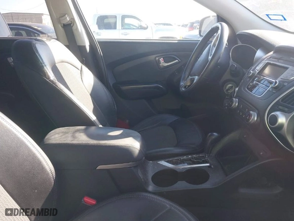 2013 Hyundai Tucson GLS with VIN KM8JU3AC7DU636203, listed as a IAAI auction lot 41673910 with 115,584 mi miles. Bid and sale history available at carsss.com. Image 5.