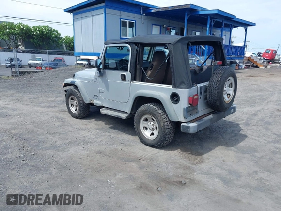 2004 Jeep Wrangler Sport with VIN 1J4FA49S04P781581, listed as a IAAI auction lot 42078693 with 111,123 mi miles and . Bid and sale history available at DreamBid. Image 3.