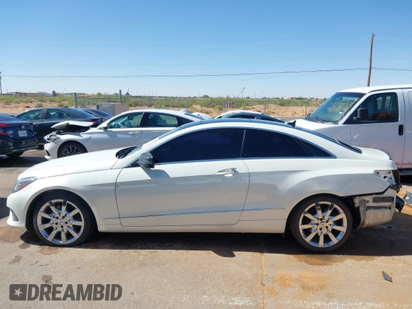2014 Mercedes-Benz E 350 with VIN WDDKJ8JB7EF257896, listed as a IAAI auction lot 42291137 with 124,499 mi miles and . Bid and sale history available at DreamBid. Image 14.