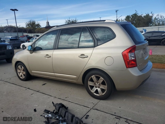 2007 Kia Rondo LX with VIN KNAFG526X77040461, listed as a Copart auction lot 77202004 with 125,132 mi miles and Salvage Title. Bid and sale history available at carsss.com. Image 2.