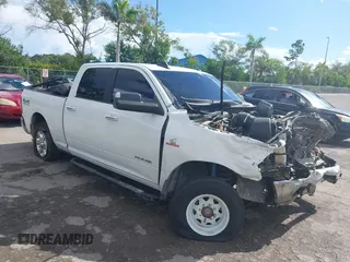 2019 Ram 2500 Lone Star with VIN 3C6UR5DL5KG598035, listed as a IAAI auction lot 40233866 with 126,042 mi miles and . Bid and sale history available at DreamBid. Image 1.
