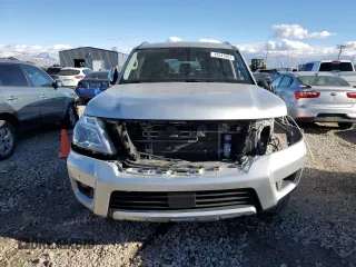 2018 Nissan Armada SL z VIN JN8AY2NC2J9556940, wystawiony jako Copart lot #85341904 z przebiegiem 133 725 mil mil oraz Szkoda całkowita • Salvage title. Historia ofert i sprzedaży dostępna na DreamBid. Obrazek 5.