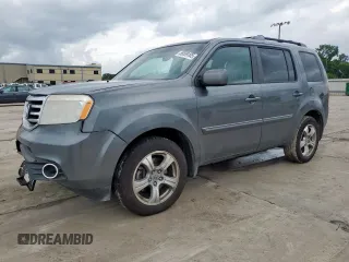 2012 Honda Pilot EX-L with VIN 5FNYF4H56CB077633, listed as a Copart auction lot 58699105 with 218,040 mi miles and Salvage title. Bid and sale history available at DreamBid. Image 1.