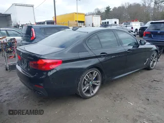 2020 BMW 5 Series M550i xDrive z VIN WBAJS7C09LCD45078, wystawiony jako IAAI lot #41850274 z przebiegiem 75 613 mil mil oraz . Historia ofert i sprzedaży dostępna na DreamBid. Obrazek 4.