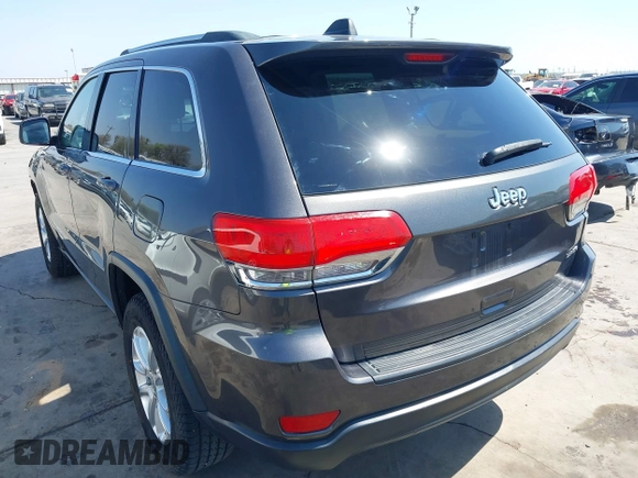 2015 Jeep Grand Cherokee Altitude with VIN 1C4RJEAG0FC952260, listed as a IAAI auction lot 41738692 with 124,197 mi miles. Bid and sale history available at carsss.com. Image 3.