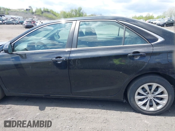 2015 Toyota Camry XLE with VIN 4T4BF1FK5FR491688, listed as a IAAI auction lot 42189497 with 135,126 mi miles and . Bid and sale history available at DreamBid. Image 14.