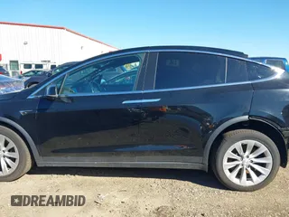 2019 Tesla Model X 75D with VIN 5YJXCDE2XKF161371, listed as a IAAI auction lot 41174741 with 34,979 mi miles. Bid and sale history available at carsss.com. Image 13.