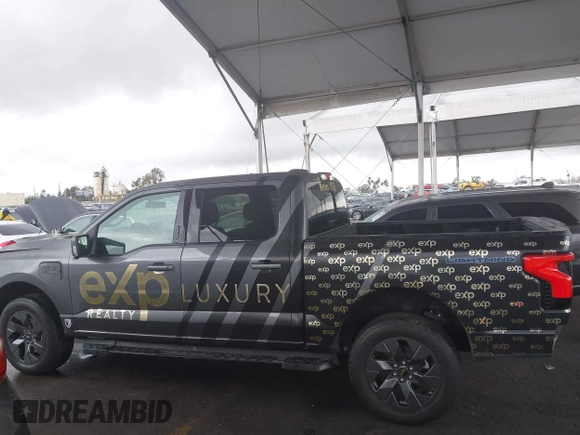 2022 Ford F-150 Lightning Pro z VIN 1FTVW1EL8NWG14070, wystawiony jako IAAI lot #41776980 z przebiegiem 14 812 mil mil oraz . Historia ofert i sprzedaży dostępna na DreamBid. Obrazek 15.