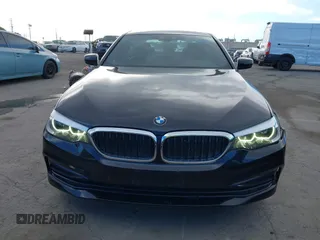 2019 BMW 5 Series 530i with VIN WBAJA5C54KWW45379, listed as a IAAI auction lot 41276092 with 77,025 mi miles. Bid and sale history available at carsss.com. Image 12.