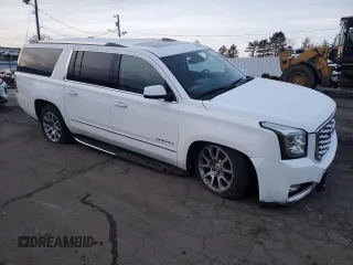2020 GMC Yukon XL Denali with VIN 1GKS2HKJ1LR299560, listed as a Copart auction lot 84943284 with 99,084 mi miles and Salvage Title. Bid and sale history available at carsss.com. Image 4.