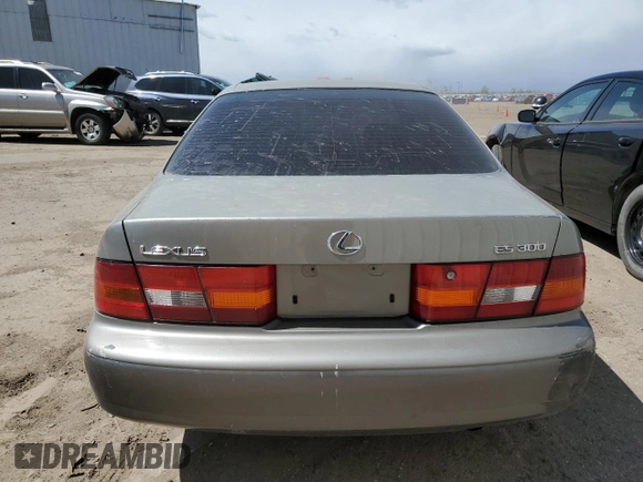 1998 Lexus ES 300 Luxury Sport Sdn with VIN JT8BF28G5W5035342, listed as a Copart auction lot 54184784 with 1,446 mi miles and Salvage Title. Bid and sale history available at carsss.com. Image 6.