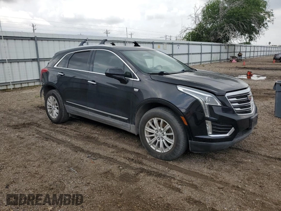 2017 Cadillac XT5 FWD with VIN 1GYKNARS9HZ237365, listed as a Copart auction lot 54190955 with 89,722 mi miles and Salvage Title. Bid and sale history available at DreamBid. Image 4.