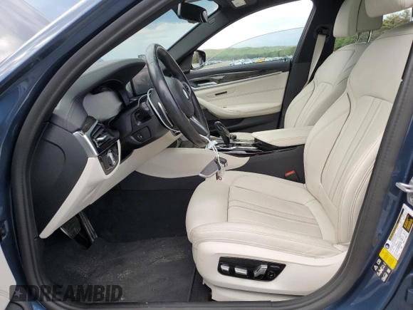 2023 BMW 5 Series M550i xDrive with VIN WBA13BK06PCM31937, listed as a Copart auction lot 66490494 with 24,972 mi miles and Salvage title. Bid and sale history available at DreamBid. Image 7.