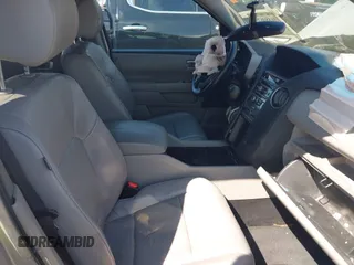 2013 Honda Pilot EX-L with VIN 5FNYF3H59DB022797, listed as a IAAI auction lot 41880675 with 206,359 mi miles and . Bid and sale history available at DreamBid. Image 5.