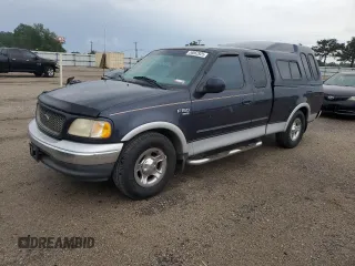 2000 Ford F-150 XL with VIN 1FTRX17L7YNC24292, listed as a Copart auction lot 58852925 with 213,318 mi miles and Salvage title. Bid and sale history available at DreamBid. Image 1.
