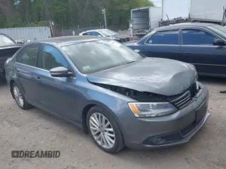 2014 Volkswagen Jetta TDI w/Premium with VIN 3VWLL7AJ3EM445368, listed as a IAAI auction lot 42208621 with 131,235 mi miles and . Bid and sale history available at DreamBid. Image 1.